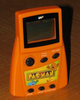   electronic handheld arcade game orange body pacman 2001 MGA 1980 Namco