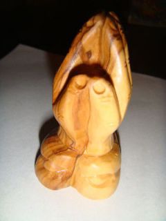 PRAYING HANDS MADE FROM OLIVE WOOD IN THE HOLY LAND. HAND CARVED