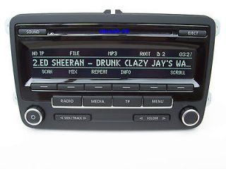 VW RCD 310 RADIO CD  WITH CODE & VW HANDBOOK MANUAL