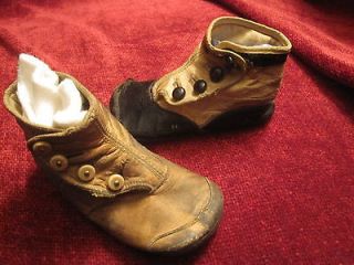 very cool mismatched pair of victorian era button up baby shoes old 
