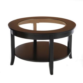 black round coffee table in Tables