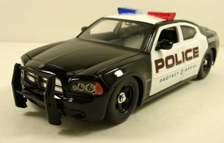   Dodge Charger R/T Police Car 124 scale diecast model Jada Heat Series