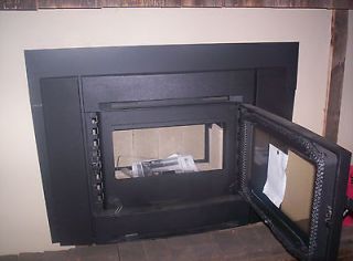wood fireplace insert in Fireplaces
