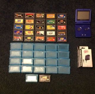 Game Boy Advance SP 26 Games, 21 Cases, Charging Adapter.