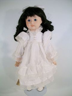   Brinns Porcelain Doll Communion Dress & Bible Black Hair Blue Eyes