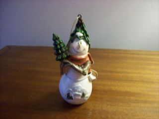 tii Collections Snowman Christmas Ornament holding a tree