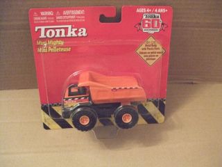 Tonka 60 th anniversary no 768 Orange Mighty Dump Truck 4 inches long 