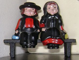 Vintage Dalecraft Amish People Seated On Bench Cast Iron Salt & Pepper 