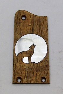 Truss Rod Cover with Howling Wolf & Moon Inlay will fit Tacoma