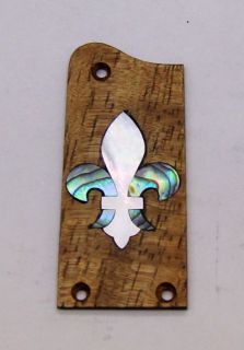 Truss Rod Cover with Fleur De Lis Inlay will fit Tacoma