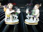 PAIR OF GERMAN PORCELAIN FIGURINES CHILD WITH GOAT & FLOWERS W CHELSEA 