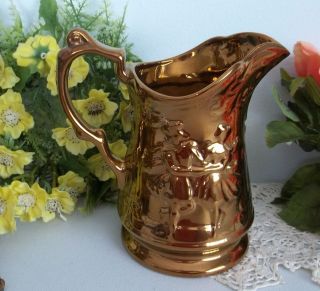 Wade festival pattern copper luster pitcher