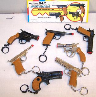 12 ASST LARGE CAP GUN KEY CHAINS novelty toy PISTOL play guns 