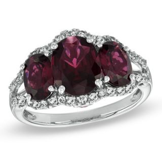 Oval Garnet and Lab Created White Sapphire Three Stone Ring in 