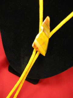   Tan/Gold Free Form Polished Stone Slider on Gold Cord with Gold Tips