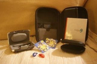 UNITRON HEARING AIDS IN CASE WITH BATTERIES, WAXSHIELD AND BOOKLET