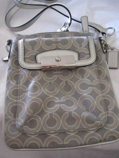 NWT 47652 SVAKW Kristin Metallic Op Art Sateen Swingpack Dove / Silver