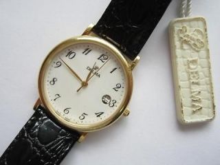 Delma N.O.S gents watch round case white dial runs and keeps time 