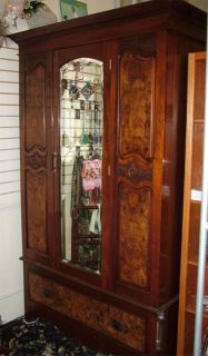 Must sell Antique Beautiful Walnut Burlwood Armoire w/Mirror.