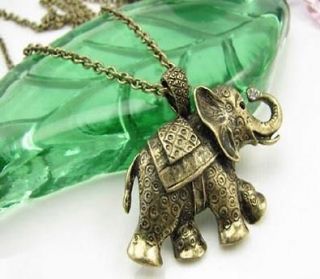 gold elephant pendant in Jewelry & Watches