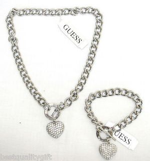 set of two guess silver tone bracelet neckl ace puffed
