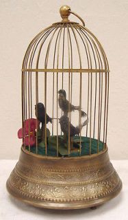 animated singing bird in a brass cage music box  57 00 12 