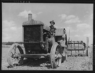 farmer with tractor fairfield bench farms montana 