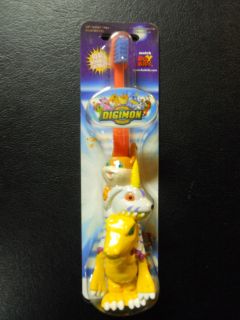 BRAND NEW 2000 Digimon Bendable Childrens Toothbrush Ora​nge