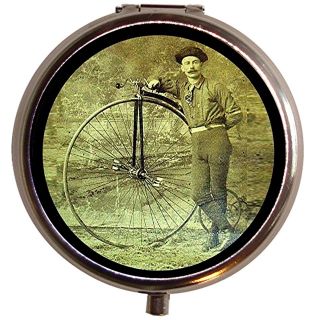 victorian man on high wheel bicycle retro pill box case