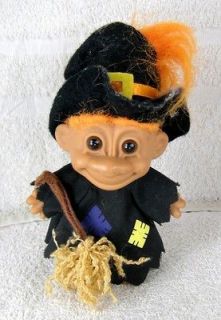 mini troll doll figure dressed as a halloween witch time