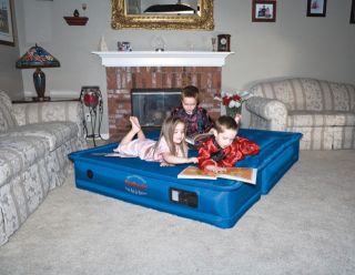 Converts into queen sizeair mattress with wheel well inserts 