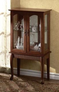 Elegantly proportioned curio cabinet graciously accents your favorite 