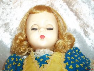 up for sale is a vintage lissy doll that stands 12 tall she is in very 