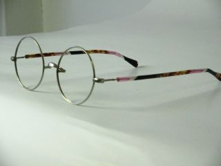 Antique round eyeglasses w. antiall. covered arms   F9