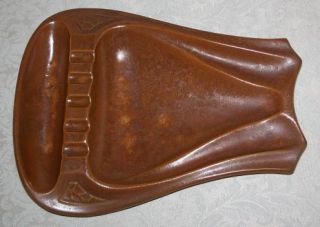 am offering this Vintage McCoy Pottery Ashtray. The color is a dark 