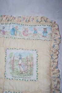 Peter Rabbit crib comforter by Quiltex. It is reversible showing a 