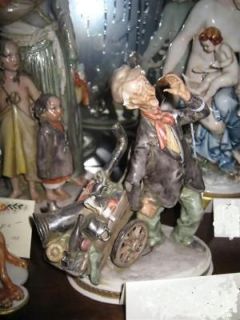 capodimonte cappe man with cart  525 00