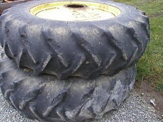 18.4 x 38 GY 6ply tires on John Deere tractor 9 bolt press steel rims 