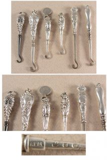 Description A collection of 6 silver handled glove button hooks. 2 