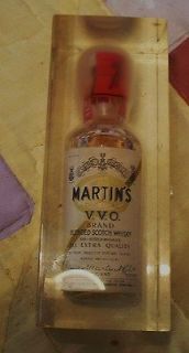   MATINS original V.V.O. blended scotch bottle in acrylic block