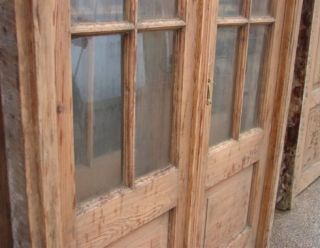 Antique double french door with transom and glasses installed