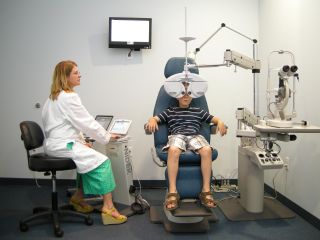 eye exam $ 100 value new optometry office promoting the eye health 