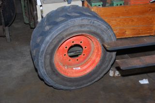 For sale is a USED, BOBCAT TIRE AND WHEEL. Seriously Worn.USE THIS AS 
