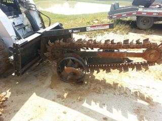 Bobcat tire wheel track skidsteer loader trencher machine attachment 