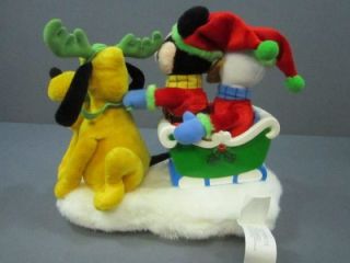 Animated Pluto Mickey Donald on A Sleigh with Music by Gemmy 