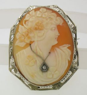 Cameo measures 1.75 by 1.35 inches. Frame measures 1.90 by 1.50 inches 