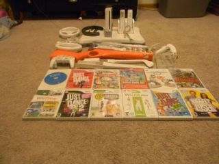   Wii Bundle Lots of Games and Accessories Wii Fit Plus 12 Games