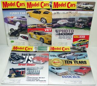 this auction includes a lot of 5 2009 model cars magazines that are in 