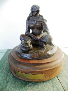 This is a bronze sculpture by Asa Ace Powell (1912 1978) titled 