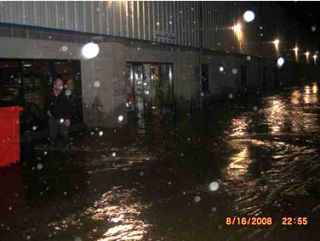 outside the showroom where the river had burst